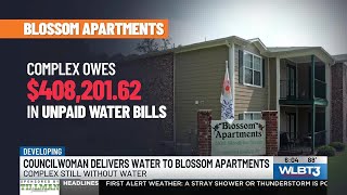 Jackson councilwoman delivers water to Blossom Apartments, days after shutoff
