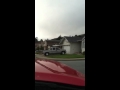 Man watering lawn from passenger seat of truck WTF???