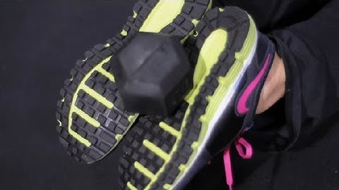 How to: Lying Leg Curl With a Dumbbell at Home : Exercises Using Dumbbells