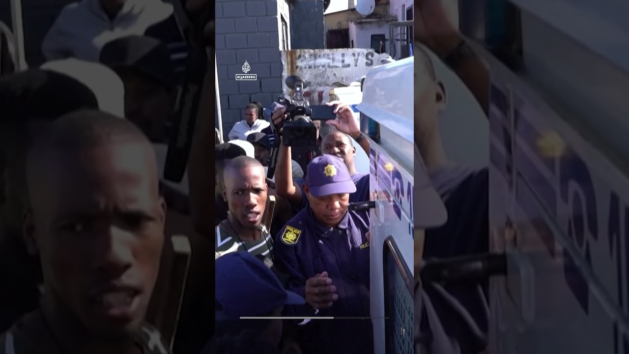 Tense standoff at an anti-migrant protest in a South African town | AJ #shorts