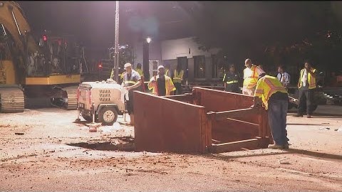 Crews work to repair massive sinkhole in Midtown