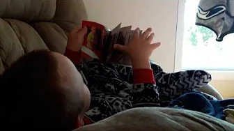 JARRETT LOOKING AT PICTURES