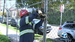 Controversial fence surrounding Echo Park Lake starts coming down after 2 years