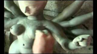 Me making a Durga pratima / murti