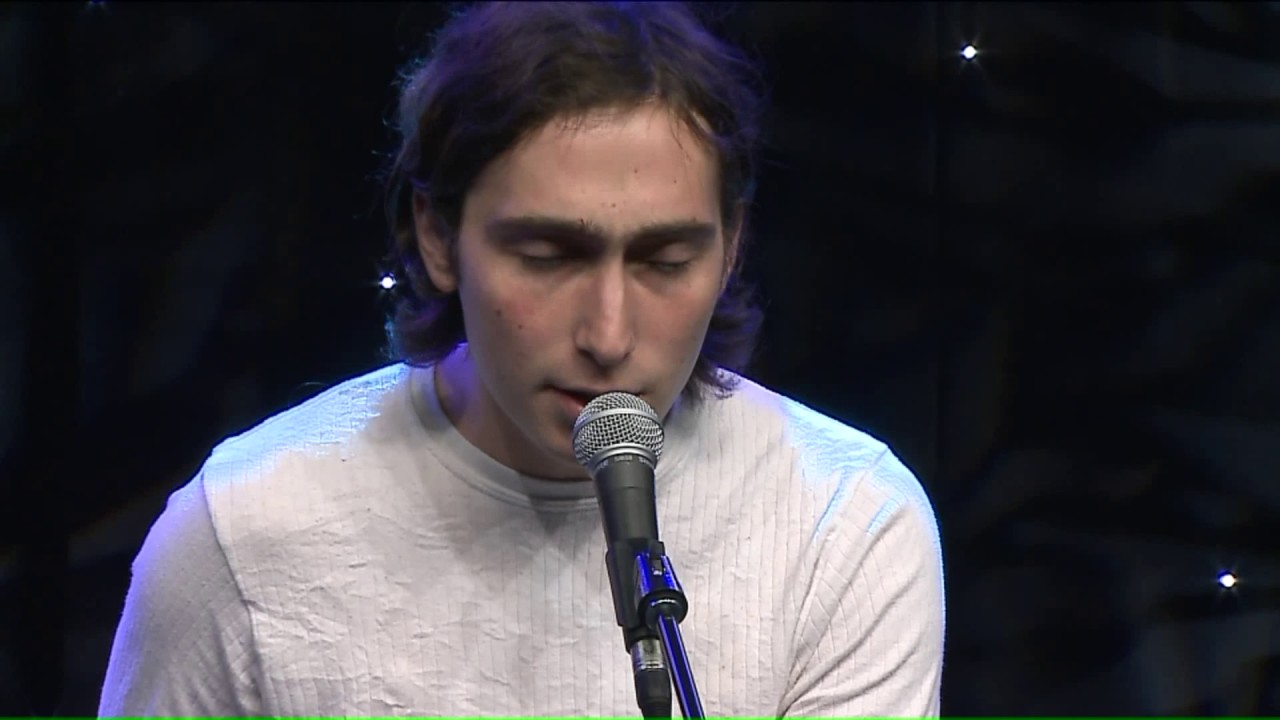 newspaper mockup Chicago band Whitney performs