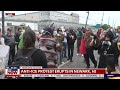Protester bites 2 ICE agents in Newark, DOJ files charges