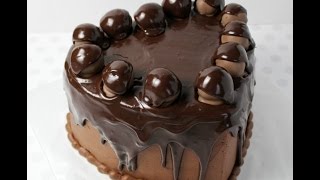 This rich chocolate cake is covered in buttercream, topped with balls,
then pourable ganache. who can say no to a...