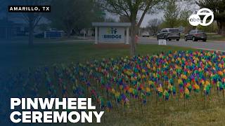 Pinwheel ceremony marks Child Abuse Awareness Month at The Bridge advocacy center