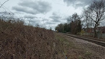 Class 317 tones at foot crossing near ware