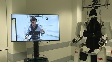 Paralysed man walks again with brain-controlled exoskeleton | AFP