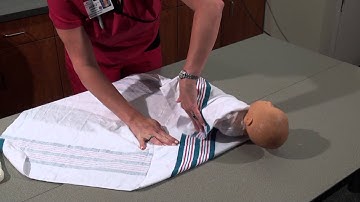 Parenting and Infant Care | How to Swaddle a Baby | Woman
