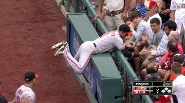 Flaherty reaches over railing to make catch