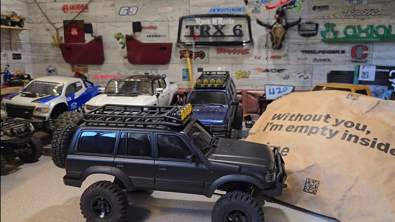 FMS FCX18 Toyota LC80 Dark Evolution gets some awesome brass wheels and aluminum bumpers.