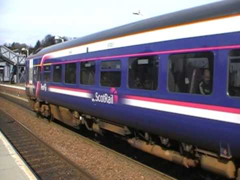 A First Scotrail Class 170 no. 170461 joined on to a Class 158 no. 158719 leaves North Queensferry heading for Edinburgh Waverley whilst 170404 can be seen departing in the other direction