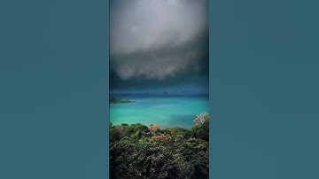Impressive contrast of thunderclouds and the paradise island of Koh Chang, Thailand