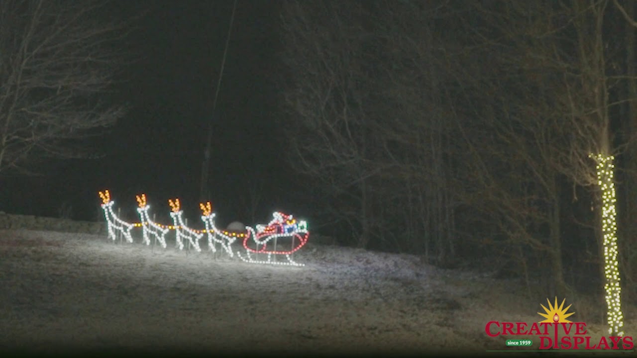 Creative Displays, Inc. Commercial Christmas Light Displays - Silhouette Santa w/ Animated Reindeer