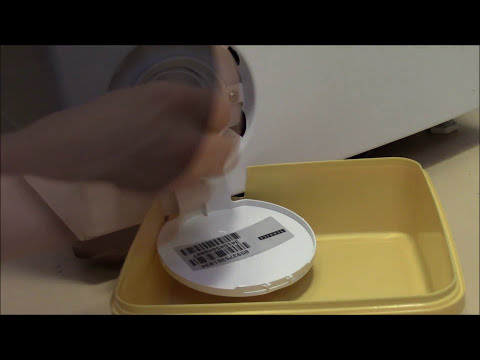 How to clean washing machine lint trap without making a mess