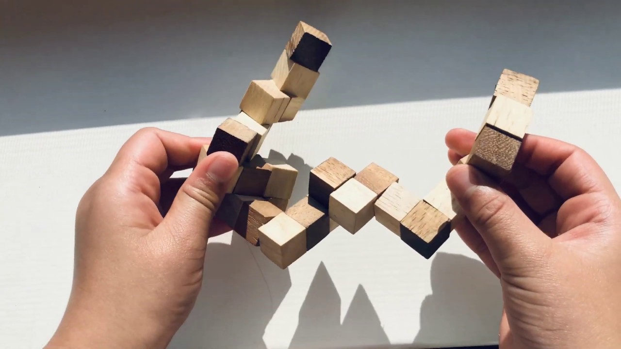 How to solve a wooden snake puzzle? YouTube