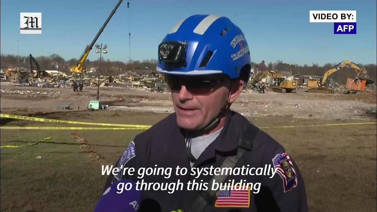 Rescuers search rubble at collapsed candle factory after Kentucky