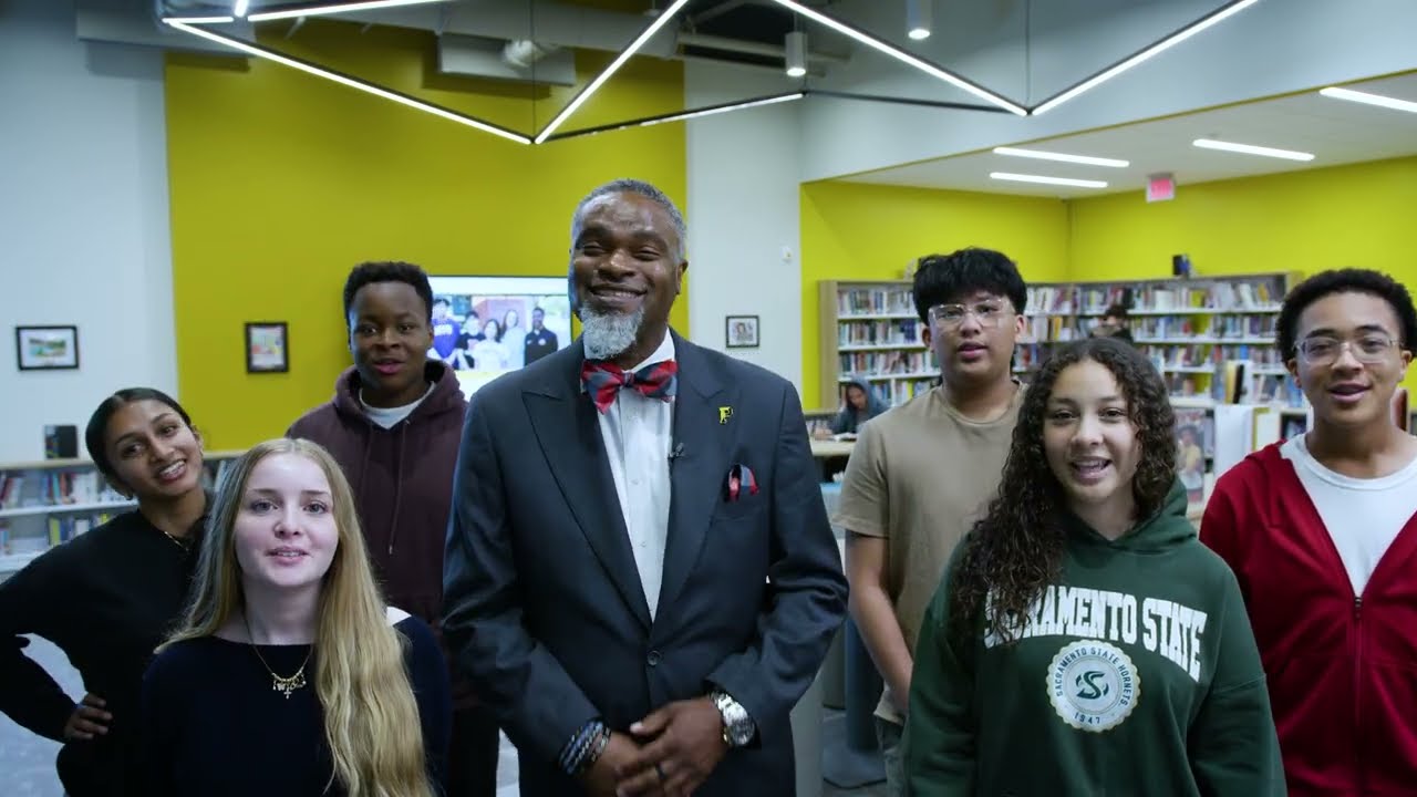 Video preview image of superintendent with students in video; click to visit the ParentSquare post with the video