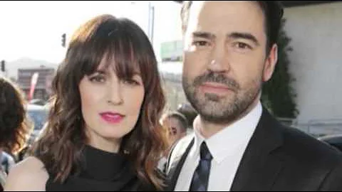 Dewitt 'Touchy Feely' With Husband Livingston