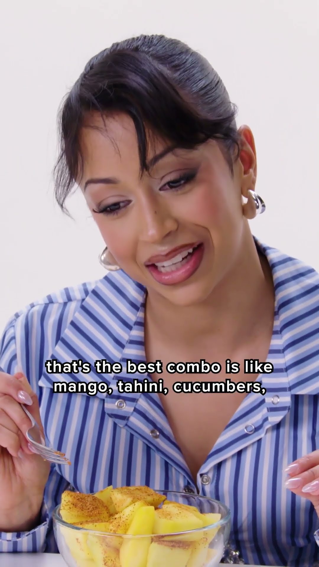 Liza Koshy is EXTREMELY passionate about mango + tajin ??