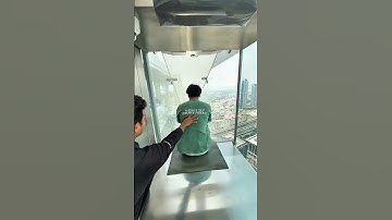 Going Down The Scariest Glass Slide In The World 😳