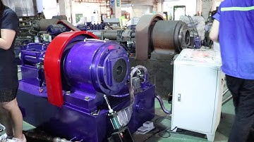 Metal pipe embossing machine.