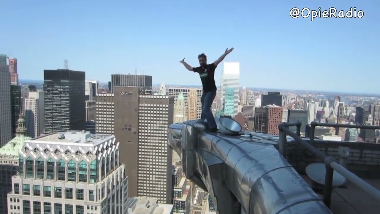 Urban Explorer walks out onto Chrysler Building gargoyle in nyc