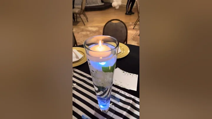 Repass or home going celebration set up idea! Floating centerpieces and Tuxedo backdrop