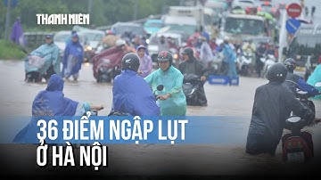 Vất vả đi qua 36 điểm ngập lụt ở Hà Nội sau bão số 5
