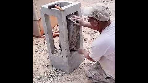 A hammer and chisel carved out a stone stool