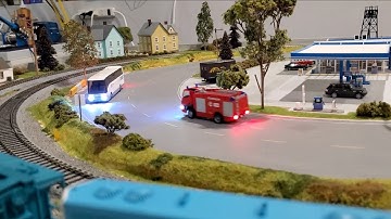 Faller Car System - Bus & Fire Truck Running On A More Finished Layout