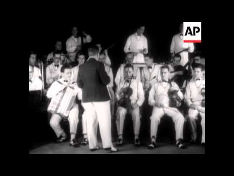 MR JACK HYLTON INTRODUCES A YOUNG BRITISH COMPOSER AND REHEARSES A NEW NUMBER WITH BRITISH MOVIETONE