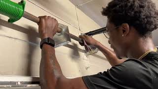 How to Replace Center Bearing Plate on Garage Door Torsion Spring Shaft