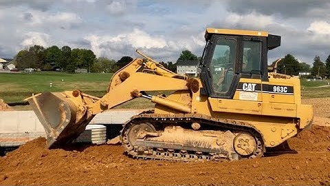 Caterpillar 963C Working on a Back Fill