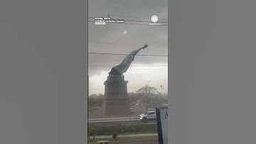 "Statue of Liberty" Crashes to Ground in High Winds!
