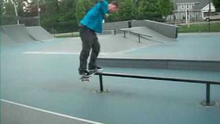 Adam kickflip backside lipslide at Wawa West Goshen skatepark flatbar