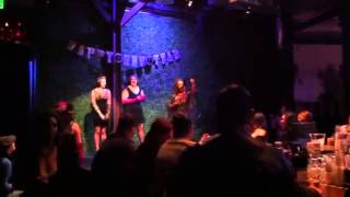 Allison winning a Burlesque contest in glove peeling.