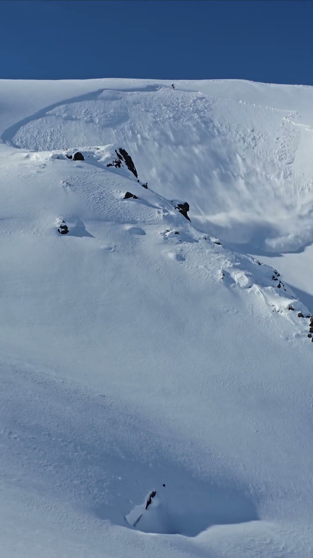 Skier Triggers Massive Avalanche || ViralHog