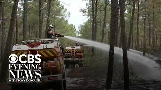 France makes major progress in wildfire fight, but danger still lurks