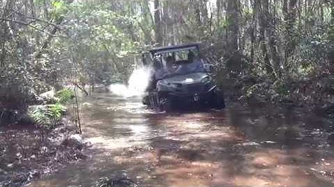 Polaris Ranger 800 going through a nasty mud hole