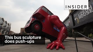 Giant Robot Bus Sculpture Does Push-Ups screenshot 1