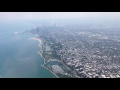 Flying over Chicago downtown and Lake Michigan