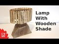 Solid wood lamp with wooden shade.