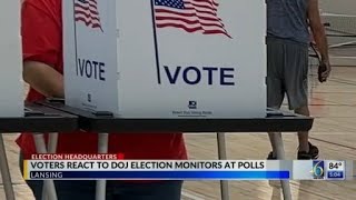 Voters react to DOJ election monitors at polls