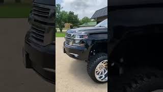 Chevy Tahoe On A 7-9 Lift