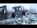 Belarus Mtz 1025 forestry tractor logging in winter forest