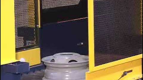 Omni Metalcraft Corp. Rim Handling Continuous Vertical Conveyor