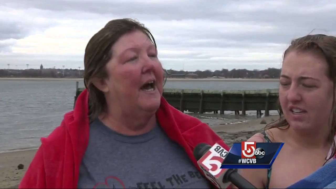 Hundreds take New Year's plunge into Boston Harbor